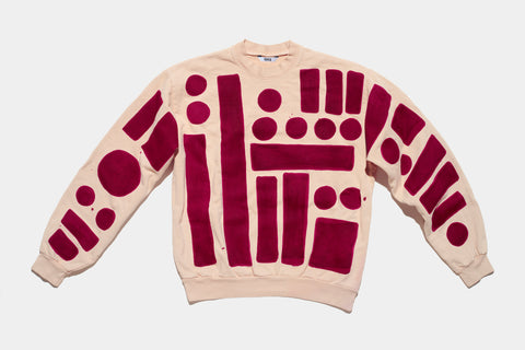 100% cotton peach sweat shirt, perfectly cut, with hand-painted, maroon circles, squares and rectangles assembled in a beautiful pattern on the body and both arms.