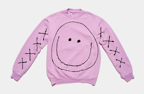 100% cotton lavender sweatshirt, perfectly cut, has large, dripping black painted smiley face on body and four black drippy x's on each sleeve