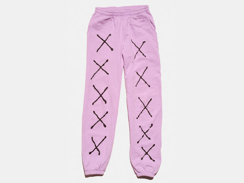 100 % cotton lavender sweat pants. Four painted, drippy black X's run down each leg. The composition continues on the other side of the shirt.